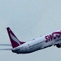 Swoop - Boeing 737-8CT - C-GDMP<br />FLL - Airport Greenbelt - 30.12.2019 - 3:29 PM<br />mit 800er Digital-Brennweite aufgenommen, deshalb sehr verpixelt
